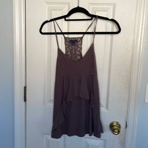 a brown/purple spaghetti strap top, ruffles on the front and lace in the back